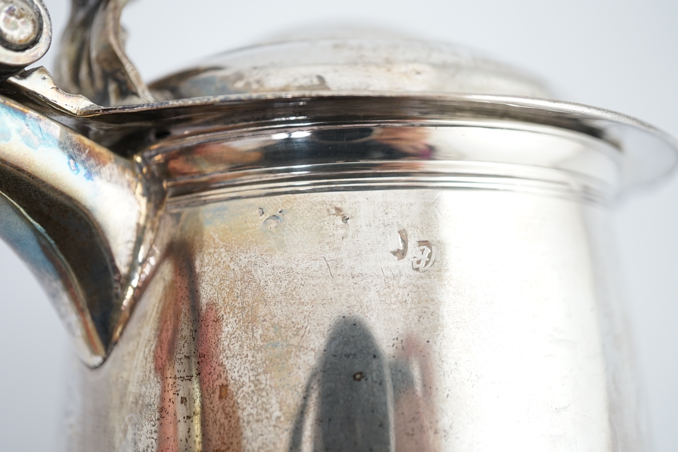 A late Queen Anne Britannia standard silver tankard, maker R?